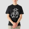 Camiseta de manga corta con cuello redondo y estampado de dibujos animados de Converse x Keith Haring para hombre, color negro