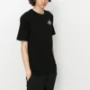 Camiseta deportiva casual de manga corta con estampado para hombre de Converse, color negro