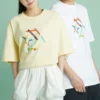 Camiseta deportiva de cuello redondo y manga corta con estampado, color amarillo claro