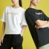 Camiseta deportiva de punto holgada de manga corta con estampado de Converse para hombre, color blanco