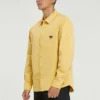 Chaqueta casual de manga larga con botones y tejido de punto para hombre de Converse, estilo retro, color dorado