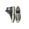 Chuck 70 High «Archive Paint Splatter – Negro»