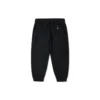Pantalones casuales Converse para hombre de color liso, tejido, con cordones y diseño «Bundle Feet», en negro