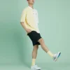 Polo de manga corta para hombre Converse con solapa y bloques de color, color amarillo crema